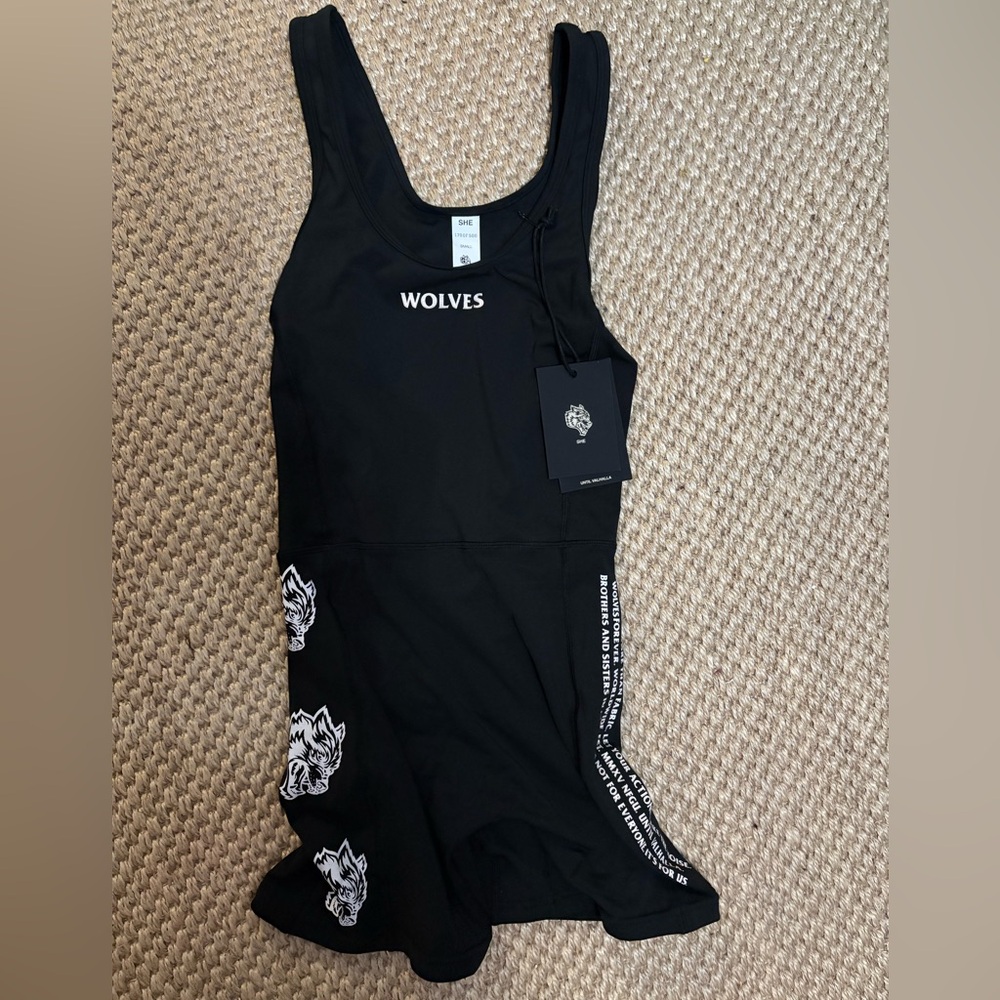 Darc sports Black Wolves onesie